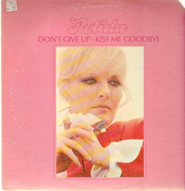 Album cover art for Don't Give Up · Kiss Me Goodbye