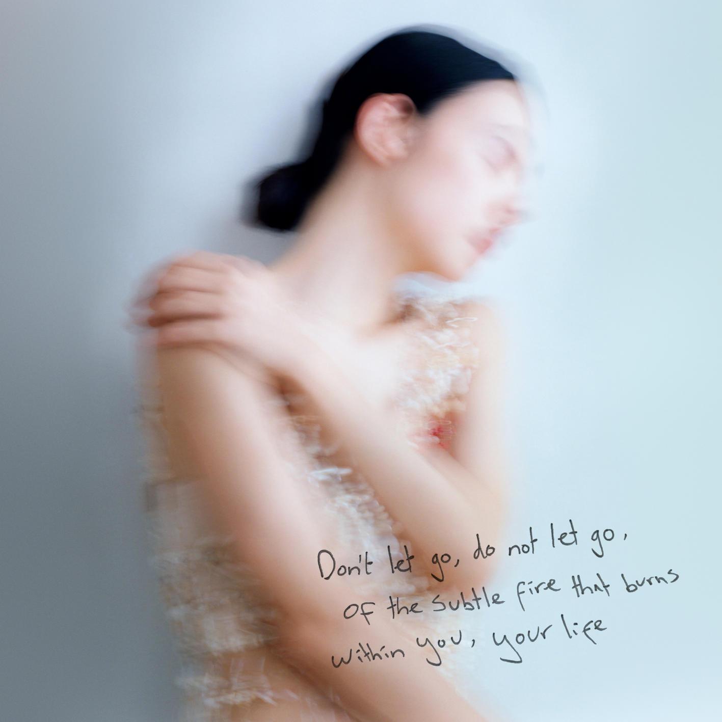 Lyric cover art as blurred background